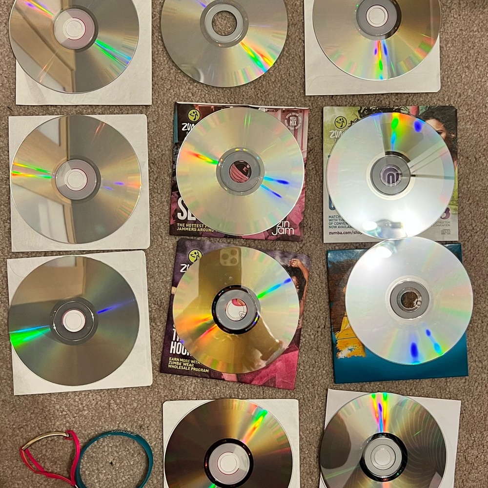 ~Lot of 10:  Lorna Jane Bracelet, Zumba Bracelet & Class Music CD's MSRP: $137+